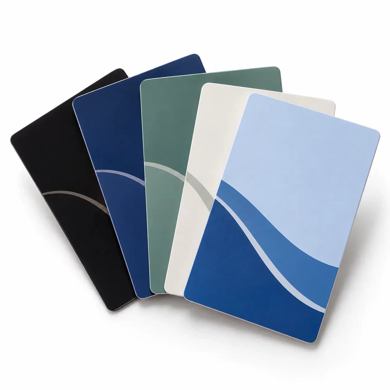 Five printed RFID hotel key cards fanned out in black, navy, sage, ivory and light blue with a wave design