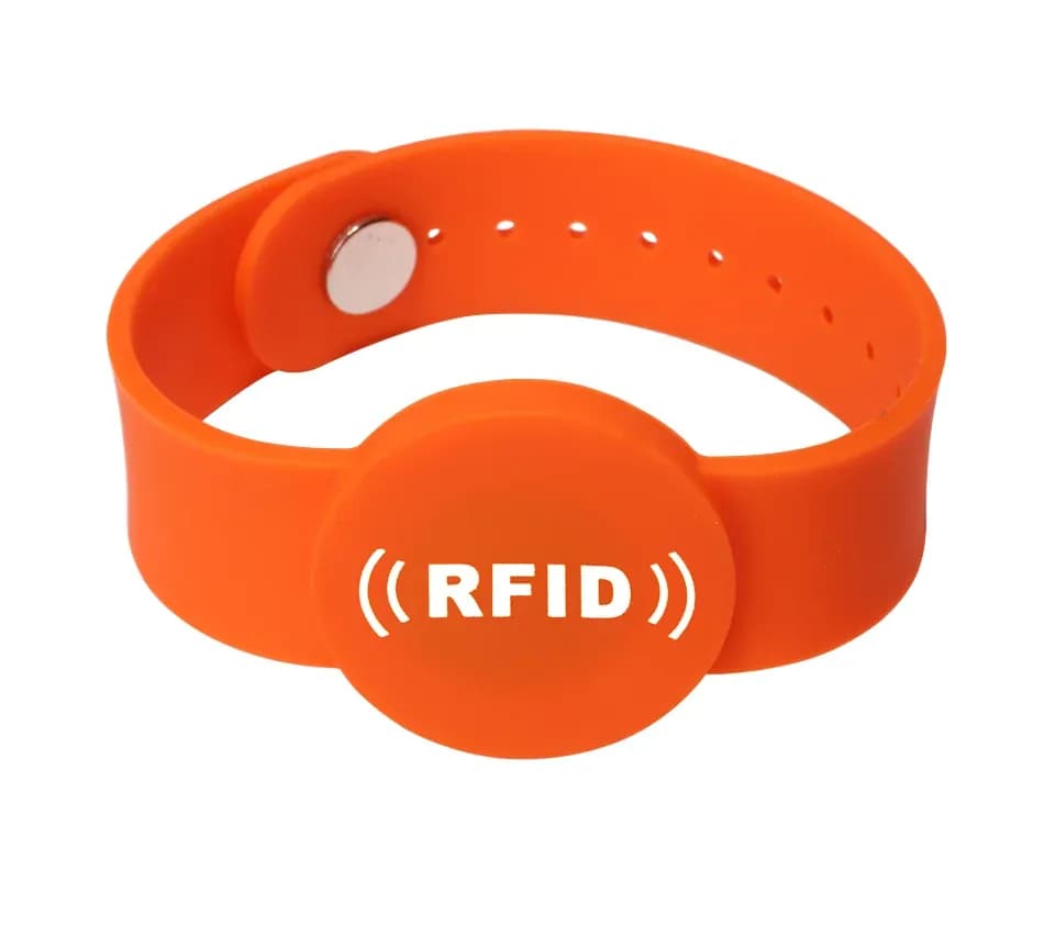 Orange adjustable silicone wristband with RFID chip housing