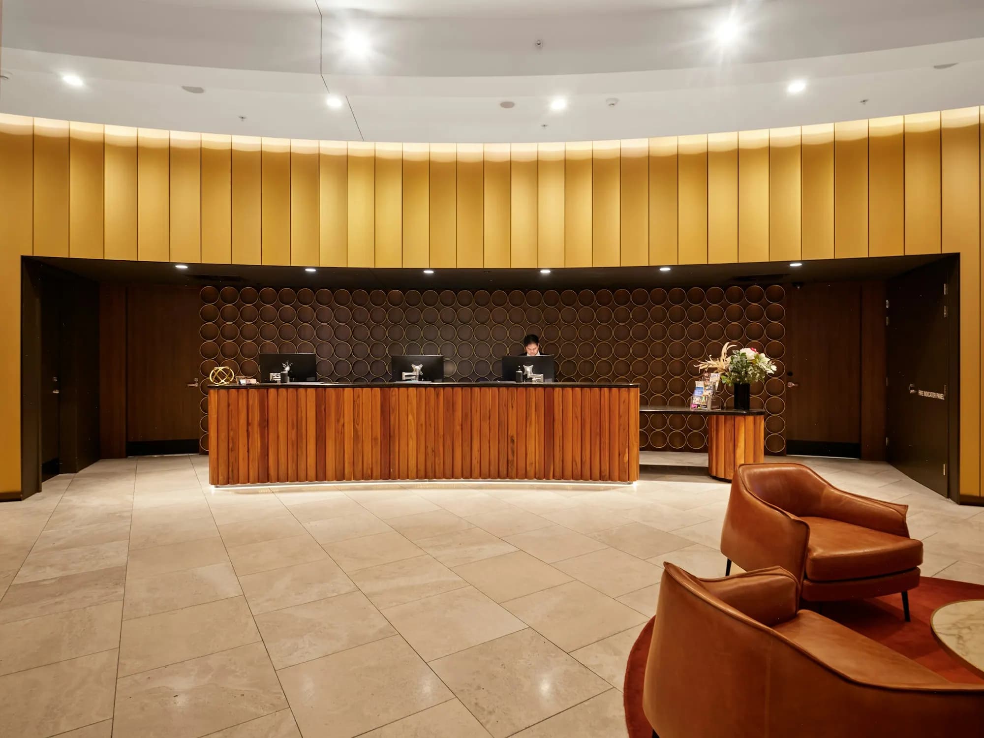 Hotel reception with a timber desk