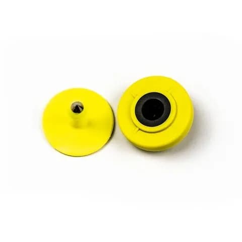 Yellow RFID animal ear tag, male and female parts